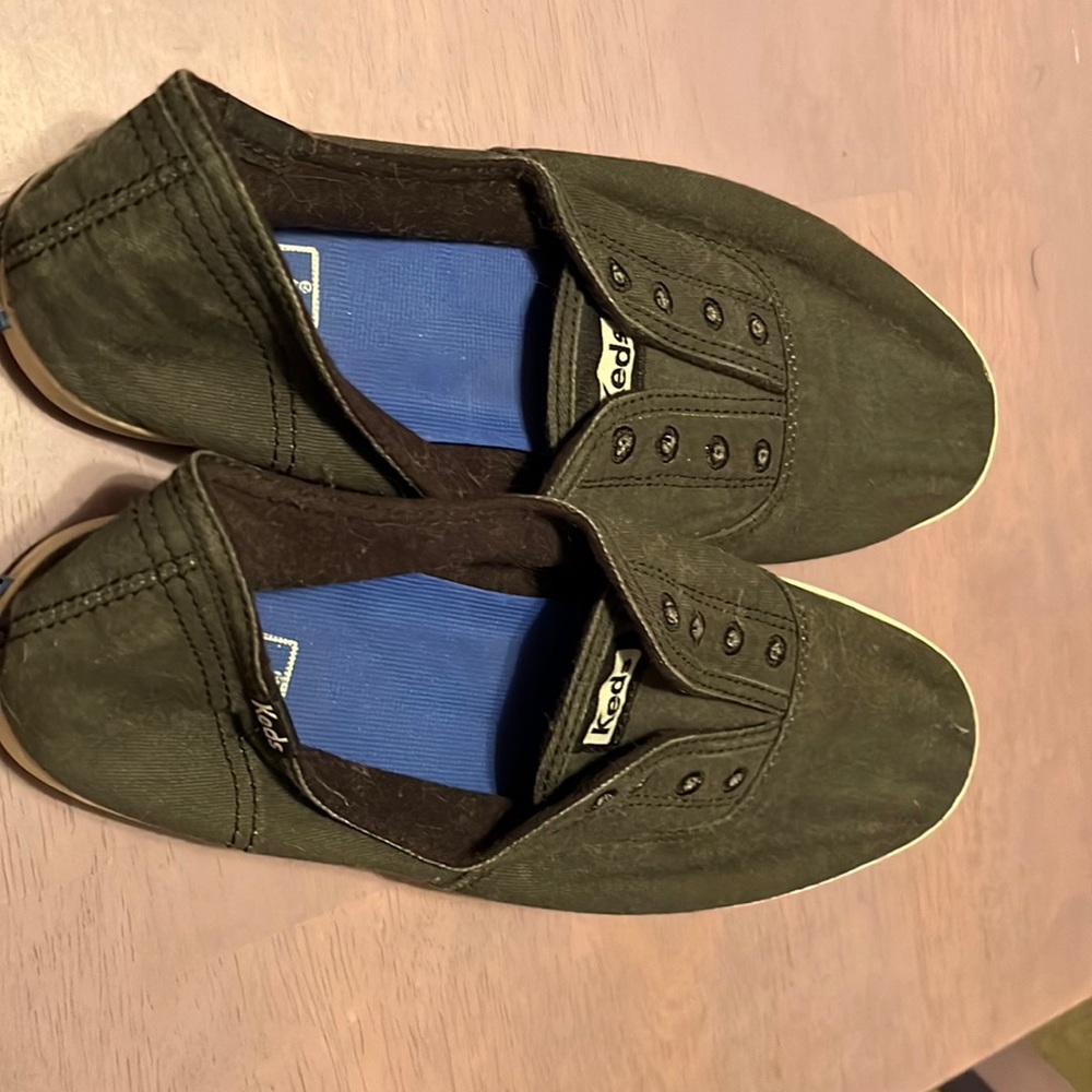 Grey Keds slide on sneakers.